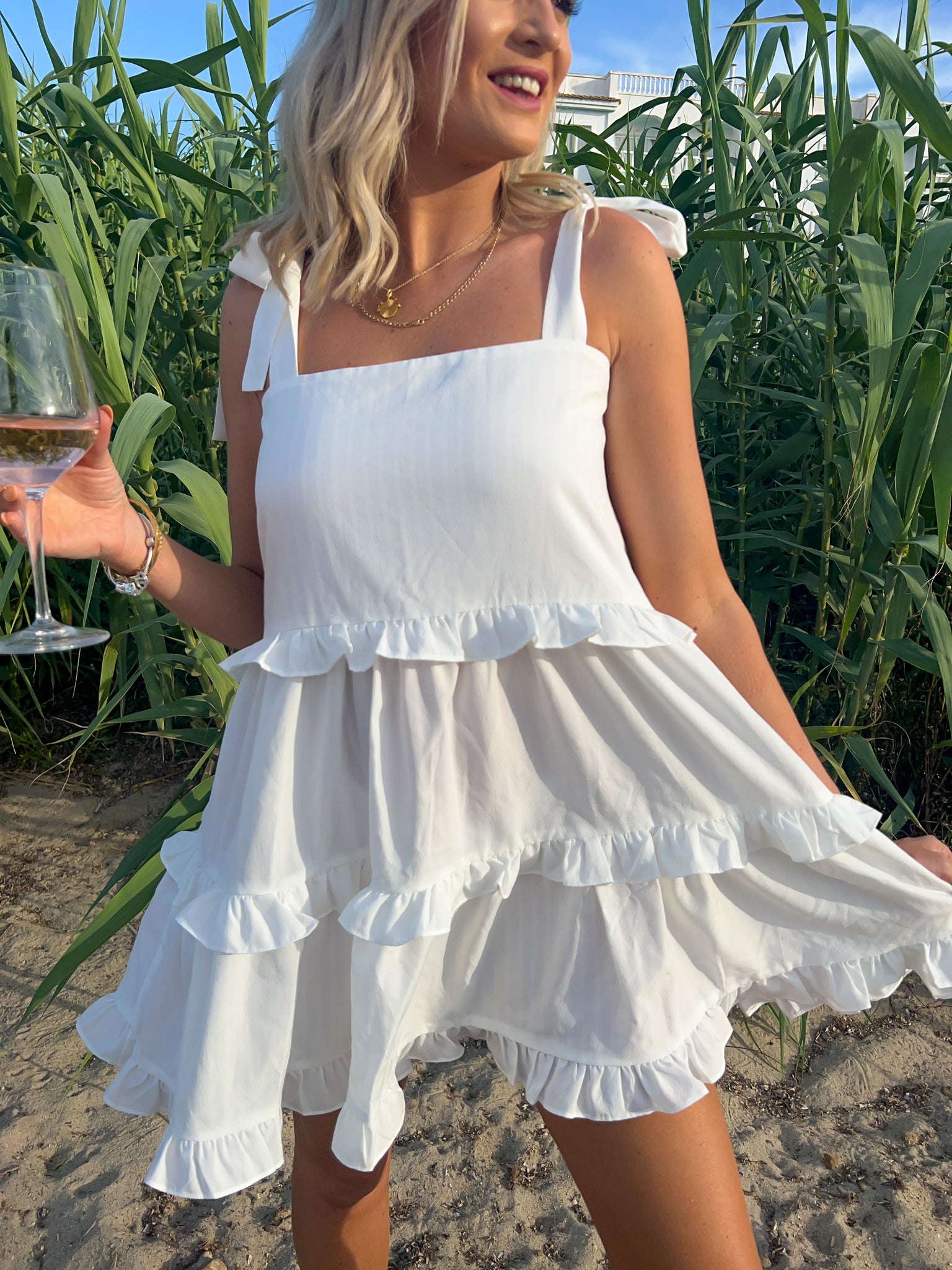 White ruffle beach dress hotsell